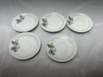 Lote de 5 pires de café em porcelana Real floral com friso ouro. Medindo 10,5cm de diâmetro.