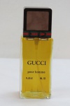 Um frasco de perfume de marca francesa, Gucci Pour Home fl 02 4,2 125 ml, aberto, vendido sem atestar.