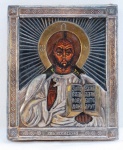 ARTE SACRA. Icone Russo Séx XX, em madeira, representando Cristo Pantocrator, em placa de cobre em alto relevo. Med. 13 x 11 cm.