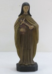 HLS- Antiga imagem esculpida em madeira policromada representando Santa Therezinha . Assinada. Med. 31 cm altura.