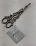 VINTAGE- Tesoura para corta uva em metal espessurado a prata, decorada com cachos de uvas e esquilo. Med. 14 cm.