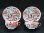 Par de xicaras em porcelana oriental dito 'casca de ovo' com decoração de gueixas e cenas do cotidiano.