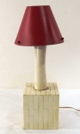 Base de abajour revestida em placa de osso, formato quadrangular, haste cilíndrica, cúpula em metal pintado de vermelho. Funcionando. Med. 41 cm.