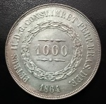 Moeda Brasileira, Império, 3º Sistema Monetário, 2º Tipo, Valor 1000 Reis, Ano 1864, Prata, Peso 12,75 g, Diâmetro 30 mm, Soberba.