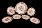 Conjunto em porcelana Germer, composto por um prato e seis pratos para pão, decorados em tonalidade terracota com cenas campestres e rica ornamentação nas bordas. Peças em bom estado de conservação, marcadas na base Germer Porcelanas  Made in Brazil. Medidas: 26,5 cm de diâmetro. / 17 cm de diâmetro.