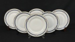 Limoges, France. Seis pratos fundos em porcelana francesa esmaltada, decorados com motivos florais em policromia e detalhes em ouro. Manufatura no verso. Medindo: 3,5 x 22,5 cm.
