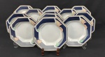 Schmidt, Brasil. Doze pratos fundos em porcelana esmaltada, em formato oitavado, decoração estilizada com policroma e frisos dourados. Sobre fundo branco. Manufatura no verso. Medindo: 3 x 23 cm.