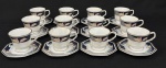 Schmidt, Brasil. Doze xícaras de chá com seus pires em porcelana esmaltada, em formato oitavado, decoração estilizada com policroma e frisos dourados. Sobre fundo branco. Manufatura no verso.