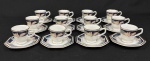 Schmidt, Brasil. Doze xícaras de café com seus pires em porcelana esmaltada, em formato oitavado, decoração estilizada com policroma e frisos dourados. Sobre fundo branco. Manufatura no verso. Um com bicado.