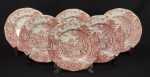 Enoch Woods, England, modelo `Old English Village`. Seis pratos rasos em porcelana inglesa esmaltada na cor rosa, com filetes em prata. Produzido na zona franca. Manufatura no verso. Medindo: 24,5 cm.  (1 prato com avaria na parte central)
