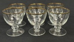 Seis cálices para vinho branco em cristal europeu translúcido, com faixa em ouro. Medindo: 8 x 7 cm 