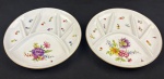 Steatita. Duas petisqueiras em porcelana esmaltada e policromada, com rica decoração floral e filetes em ouro. Com divisórias. Medindo: 22 cm.