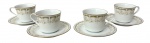 NORITAKE - Conjunto com 4 xícaras de chá com pires em porcelana japonesa Noritake, padrão Sonia (ref. 2301), com decoração em relevo floral e frisos em dourado. Peças elegantes, de fino acabamento, bordas douradas.
