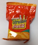 pacote lacrado da promoção Olimpíadas Coca-Cola, provavelmente da campanha de Atlanta 1996.Itens promocionais de marcas globais em embalagens originais não abertas são extremamente raros e muito valorizados, pois garantem que o conteúdo interno geralmente ENGRADADO  está em estado de novo.
