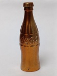 Olimpíadas Coca-Cola de 1996 (Atlanta): a Mini Garrafinha de Metal na cor Bronze.Diferente das versões de plástico, estas garrafinhas de metal são consideradas o "topo de linha" daquela promoção, pois simulavam medalhas olímpicas (Ouro, Prata e Bronze). Esta peça é um clássico absoluto da memorabilia publicitária brasileira dos anos 90.