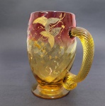 BACCARAT - MUG EM CRISTAL MOULLE RUBI E AMBAR COM BELISSIMA DECORAÇÃO EM OURO RELEVADO. ALÇA EM TORCEIL. FRANÇA, SEC. XIX. 11,5 X 10 CM