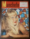 Revista Manchete Nº 196 (21/01/1956) - Capa Tutsi / Noivado de Grace Kelly - Destaque de Capa: Retrato de modelo loira com fundo geométrico colorido e a chamada "A praia inventou Tutsi". Marcas de tempo esperadas, com leve escurecimento nas bordas e desgaste suave na folha de rosto. Apresenta pequenas anotações à caneta na margem superior esquerda, comuns em exemplares de distribuição da época. Miolo e lombada íntegros.