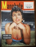 Revista Manchete Nº 80 (31/10/1953) - Edição Histórica Rara / Rainha da Primavera - Destaque de Capa: Ensaio fotográfico ao ar livre com a chamada "Rainha da Primavera". Sinais esperados de envelhecimento natural do papel (leve amarelamento). Apresenta a data grafada à caneta ("31-10-53") e pequenas anotações de controle de distribuição/banca na parte superior do logotipo. Bordas e lombada firmes.