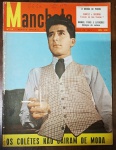 Revista Manchete Nº 59 (Maio/1953) - Edição Histórica Rara / Drama de Perón - Destaque de Capa: Modelo masculino vestindo traje social vintage com colete xadrez, segurando copo e cigarro, ilustrando a chamada de moda "Os colêtes não caíram de moda". Apresenta o desgaste natural esperado do papel jornal antigo. Contém anotações a caneta na parte superior do logotipo (data e códigos de controle de distribuição/banca da época). Bordas e miolo preservados.