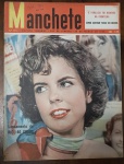 Revista Manchete Nº 205 - 24 de Março de 1956  Esta edição de meados dos anos 50 destaca um dos marcos mais importantes do cinema nacional, além de grandes eventos da política e saúde pública da época. Capa: Bordas preservadas com o amarelamento natural esperado pelo tempo.Detalhes: Mantém o exato padrão das edições anteriores, com anotações e assinaturas à caneta no canto superior direito (sobre o logotipo da Manchete), o que reforça a procedência do mesmo lote.