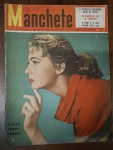 Revista Manchete Nº 155 - 9 de Abril de 1955 Item de grande apelo visual e relevância para colecionadores, destacando temas de economia nacional, esportes e crônicas sociais da época. Capa: Apresenta pequenas marcas brancas de atrito ou desgaste na parte inferior da imagem e bordas naturais do tempo.Detalhes: Mantém o exato padrão de identificação à caneta com assinaturas e notas no canto superior direito (sobre o logotipo da Manchete), o que consolida a unidade deste lote de colecionador.