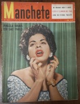 Revista Manchete Nº 136 - 27 de Novembro de 1954 (Ângela Maria na Capa)  trazendo em destaque uma das maiores e mais icônicas vozes da música brasileira, a "Sapoti" Ângela Maria. Um item de altíssimo valor cultural para colecionadores de memorabília musical, fãs da era do rádio e entusiastas da imprensa nacional. Capa: Apresenta desgaste natural nas bordas e cantos, com o amarelamento característico do papel pelo tempo.Detalhes: Mantém o exato padrão clássico do lote, exibindo as anotações e assinaturas à caneta no canto superior direito (sobre o logotipo da Manchete).