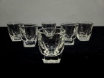 Conjunto com 6 copos para aperitivo, confeccionado em bloco de vidro francês, translúcido. Med.: 5,5 cm.