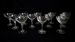 Conjunto de 12 taças para champagne , confeccionadas em cristal translúcido. Med:  13,2 cm. Obs.: 6 Com discreto bicado.