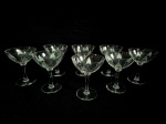 Delicado conjunto de 8 taças para champagne, confeccionadas em fino cristal europeu translucido, com decoração no padrão foguinho. Med.: 12 cm.