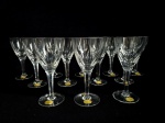 HERING - Conjunto com 12 taças para vinho branco, confeccionados em cristal translucido, lapidadas no padrão dedão. Med.: 16 cm.