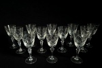 STRAUSS - H. STERN - Conjunto com 12  taças para vinho branco em cristal translucido, lapidação no padrão losango. Med.: 16 cm.