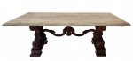 Mesa de centro retangular com base em madeira nobre ricamente entalhada com florões, volutas, folhas e flores trabalhada. Tampo em mármore. Medida total: 38 x 115 x 65 cm. somente base; 36 x 88 x 48 cm.