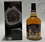 Whisky escocês Chivas Regal 12 Years Old, blended Scotch whisky envelhecido por no mínimo 12 anos, produzido pela Chivas Brothers, Escócia. Garrafa original de 1 litro, teor alcoólico de 40%, acompanhada de estojo original de fábrica. Exemplar lacrado, com rótulos preservados. Conteúdo não atestado.