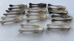 Conjunto de 11 pegadores para torrões de açúcar em metal espessurado à prata da renomada Confeitaria Colombo, com terminais em forma de concha estilizada. Medidas: 8 cm.