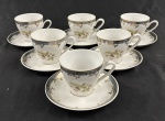 Steatita. Seis xícaras para café em porcelana esmaltada e policromada, decorado com motivos florais e frisos em ouro. Manufatura no verso.