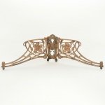 BRONZE FRANCÊS, um (1) antigo suporte para partitura de fixação em piano, período Art Nouveau, cerca de 1900, vazado em flores, marcado PLEYEL (marca de pianos franceses fundada em 1807 por Inácio Pleyel), medindo fechado 21 x 12 x 6 cm, vide foto.