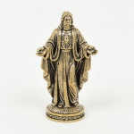 ARTE SACRA, uma (1) escultura representando imaginária do Sagrado Coração de Jesus, confeccionada embronze maciço, medindo aproximadamente 5 cm altura, vide foto.
