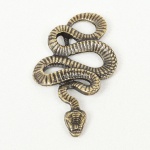 ESCULTURA, uma (1) miniatura animalista representando serpente, confeccionada em bronze maciço, medindoaproximadamente 4 cm comprimento, vide foto.