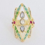 BIJUTERIA, um (1) anel, estilo Art Nouveau, representando libélulas, confeccionado em metal dourado comapliques em zircônios coloridos, esmaltação em cloisonné, tamanho do aro 14, não aparenta ter sido usado, vide foto.