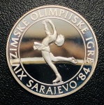 Moeda Iugoslávia - 100 Dinares 1983 - Km-98 Proof FC - Prata (.925) - 13 g - 30 mm - Comemorativa Patinação artística nos Jogos Olímpicos de Inverno de 1984.