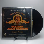 2 LP's GOLDEN FILM THEMES AS MAIS CÉLEBRES MÚSICAS DE FILMES  - Estado de conservação: CAPA- MB e MÍDIA - MB. ATENÇÃO! Produto sendo vendido no estado conforme fotos. N(Novo) / MB(Muito Bom) / B(Bom) / M(Mediano) / R(Ruim). LPs podem ter pequenos riscos superficiais q possam causar chiados. Se necessário, solicitar mais fotos, vídeos ou perguntas para análise via e-mail contato.antig@gmail.com. Questione todas suas dúvidas antes de efetuar os lances, eles são IRREVOGÁVEIS e IRRETRATÁVEIS! Leia os Termos e Condições e a caixa de informações do leilão em Home no site www.antig.com.br dando ênfase nas Informações Importantes, ao efetuar o lance o arrematante concorda com Datas, Prazos e Regras da casa de leilões Antig.