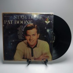 STAR DUSTY PAT BOONE - Estado de conservação: CAPA- MB e MÍDIA - MB. ATENÇÃO! Produto sendo vendido no estado conforme fotos. N(Novo) / MB(Muito Bom) / B(Bom) / M(Mediano) / R(Ruim). LPs podem ter pequenos riscos superficiais q possam causar chiados. Se necessário, solicitar mais fotos, vídeos ou perguntas para análise via e-mail contato.antig@gmail.com. Questione todas suas dúvidas antes de efetuar os lances, eles são IRREVOGÁVEIS e IRRETRATÁVEIS! Leia os Termos e Condições e a caixa de informações do leilão em Home no site www.antig.com.br dando ênfase nas Informações Importantes, ao efetuar o lance o arrematante concorda com Datas, Prazos e Regras da casa de leilões Antig.