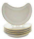 GOA FRANCE, LIMOGES - 05 pratos meia-lua em porcelana francesa, de Limoges, decorados na borda com friso dourado. Medidas: 25 x 17 cm.