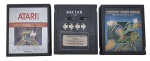 ATARI - CARTUCHOS - Lote com 3 cartuchos de jogos de Atari, sendo eles: PEGA LADRÃO, VIDEO PINBALL, TRIÂNGULO DAS BERMUDAS, DAMAS, CONDOR ATTACK e NAME THIS GAME. Observação: Possui marcas nos adesivos e não estão testados,