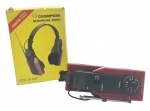 CHAMPION -  HEADPHONE RADIO - Antigo rádio portátil embutido em fone de ouvido no estilo headset. Som estéreo, AM/FM. Com antena retrátil. Feito em plástico rígido. Não testado e pequena avaria na parte da bateria.