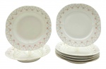J & M B, LIMOGES, FRANCE - Parte de serviço de jantar com 05 pratos rasos e 02 pratos fundos, adornados na borda com coloridas guirlandas florais. Em porcelana francesa de Limoges. Medidas: 24 cm (diâm.). Filetes dourados da borda ligeiramente desvanecidos.