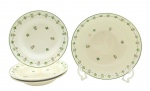 IRFM SÃO CAETANO (Cerâmica Matarazzo) - Conjunto com 01 bowl e 03 pratos fundos, decorados com coloridas guirlandas contendo coroa de louros, laços e urnas estilizadas sobre fundo marfim. Medidas: 26 x 7 cm (bowl); 22 cm (diâm. pratos). Bowl e dois pratos com bicados; bowl com ínfimas manchas.
