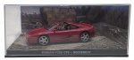 ALTAYA - 007 JAMES BOND CARS COLLECTION - FERRARI F355 GTS -GOLDENEYE - Miniatura do carro  do icônico personagem James Bond, o espião 007, Ferrari F355 GTS do filme 007 Goldeneye, em escala 1:43, feito em metal com partes plásticas, protegido em uma caixa expositora de acrílico com cenário embutido. Ano: 2008.