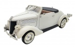WELLY - 1936 FORD DELUXE CABRIOLET - Miniatura da Welly, retratando um Ford 1936 Deluxe Cabriolet, em escala 1:24, com partes móveis, rodas livres, pneus de borracha e feita de metal com partes plásticas. Pode conter ínfimas marcas ou desgastes.