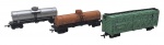 ATMA / BACHMANN - Lote com 3 vagões em escala HO, sendo 2 da Bachmann, de origem alemã e 1 da Atma, de origem brasileira. Feitos em plástico com partes de metal. Modelos: tanque e carga. Possuem desgastes e algumas marcas.